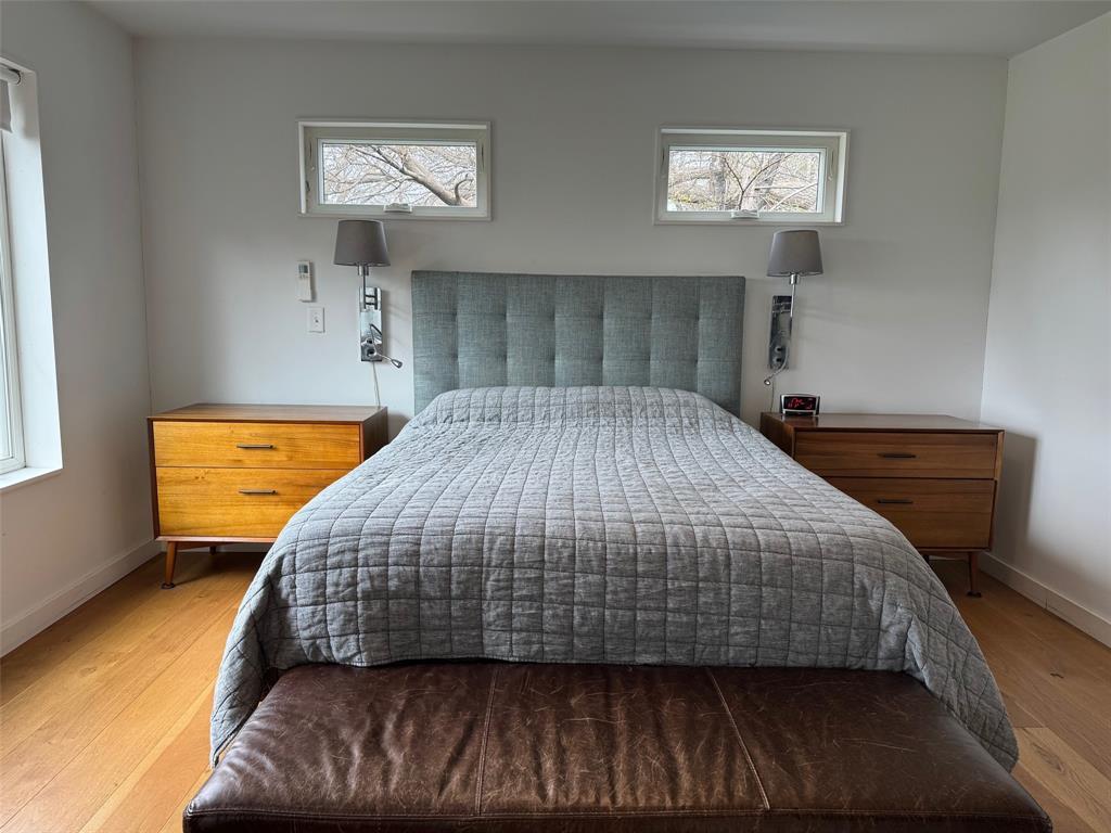 2109 Riverview Street, Unit A Austin, TX 78702 - Photo 18 of 32 a bedroom with a bed and window