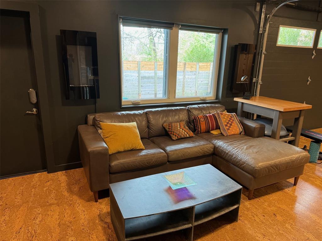 2109 Riverview Street, Unit A Austin, TX 78702 - Photo 24 of 32 a living room with furniture and a window