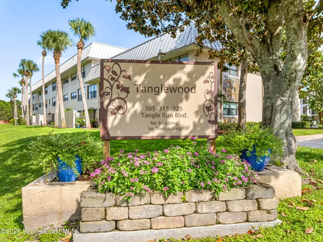 a view of a golf course with a lake