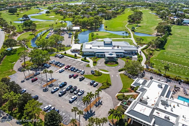 an aerial view of a house with a garden