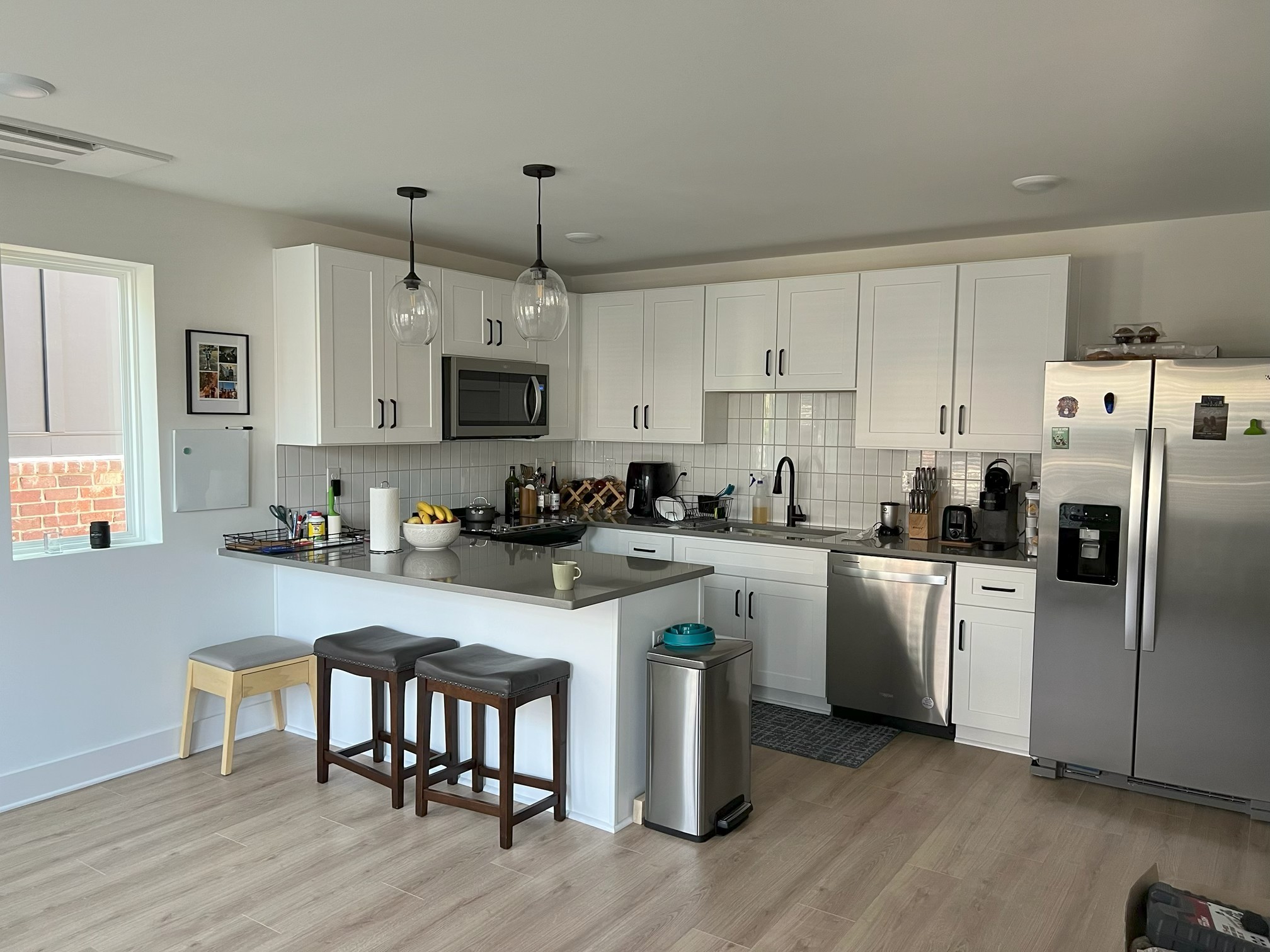 102 Duke Street, Unit 33 Nashville, TN 37207 - Photo 3 of 15 a kitchen with cabinets stainless steel appliances and a counter space