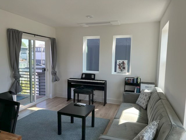 102 Duke Street, Unit 33 Nashville, TN 37207 - Photo 4 of 15 a living room with furniture and a window
