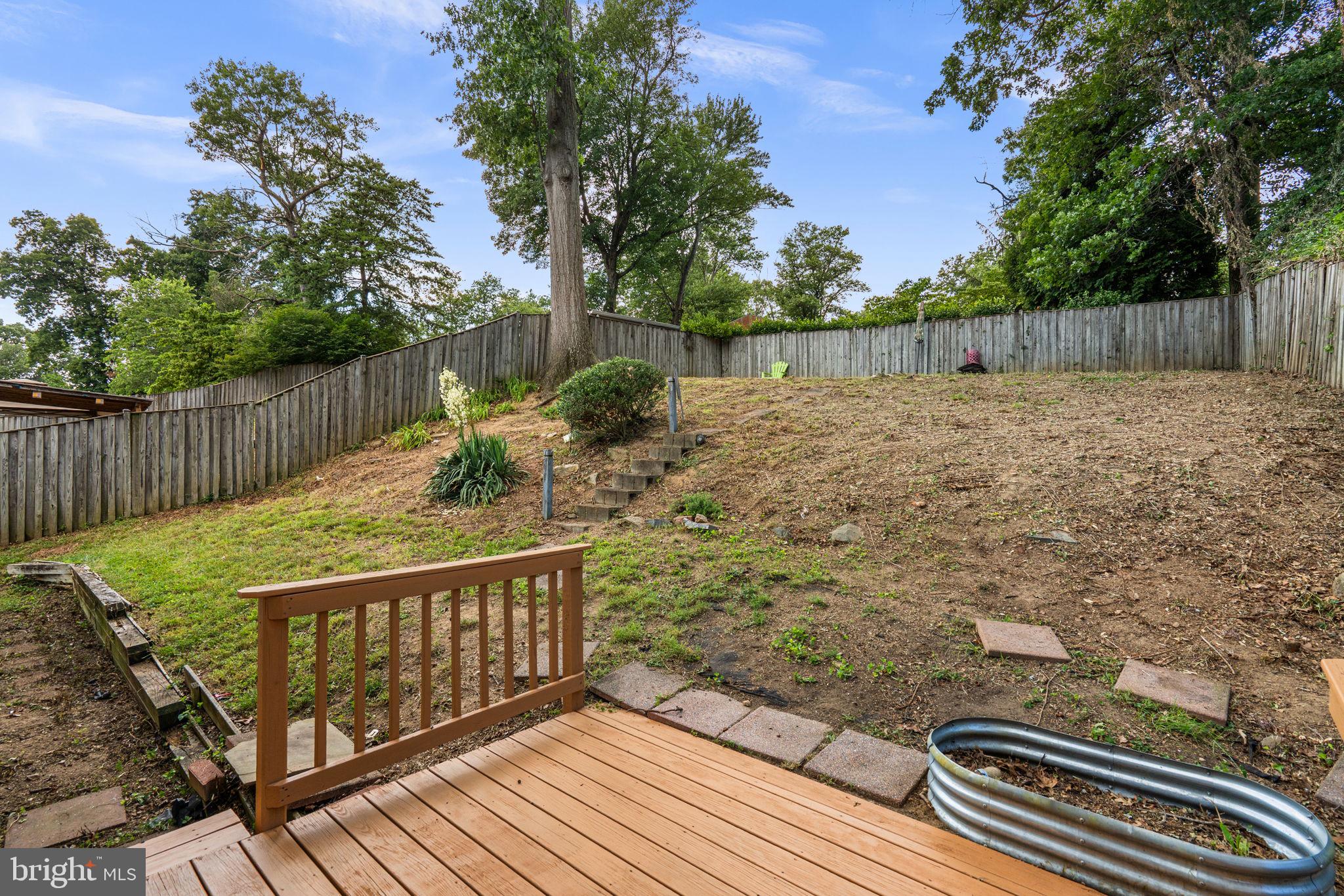 822 Loxford Terrace Silver Spring, MD 20901 - Photo 57 of 61 a view of deck with wooden floor and fence