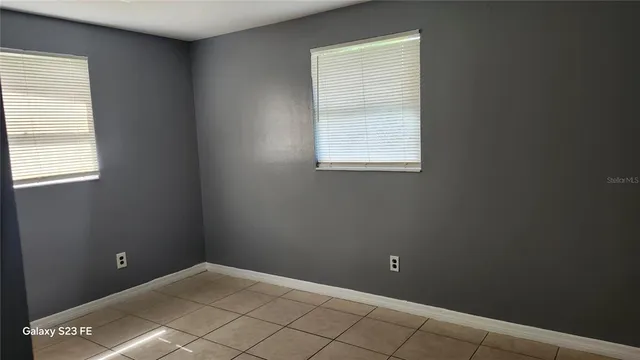 an empty room and window