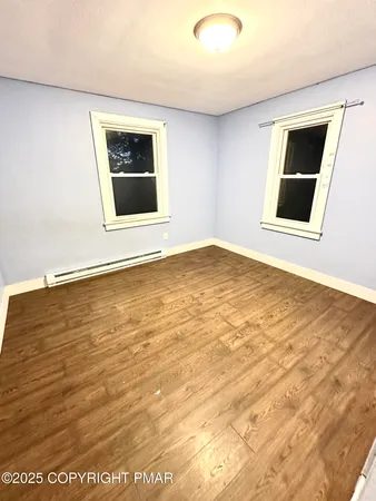 a utility room with a washing machine