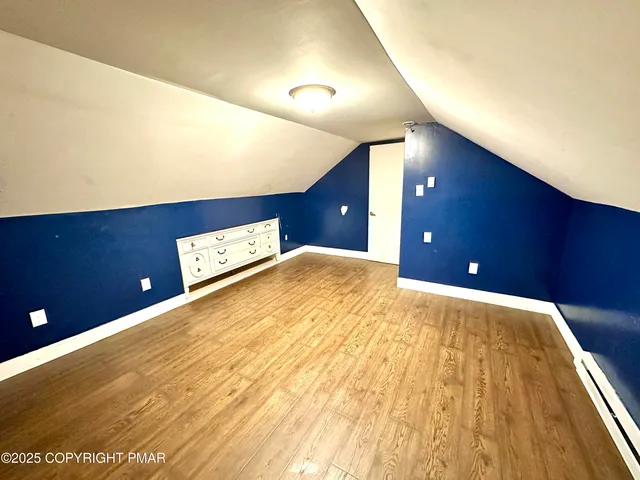 a utility room with a washing machine