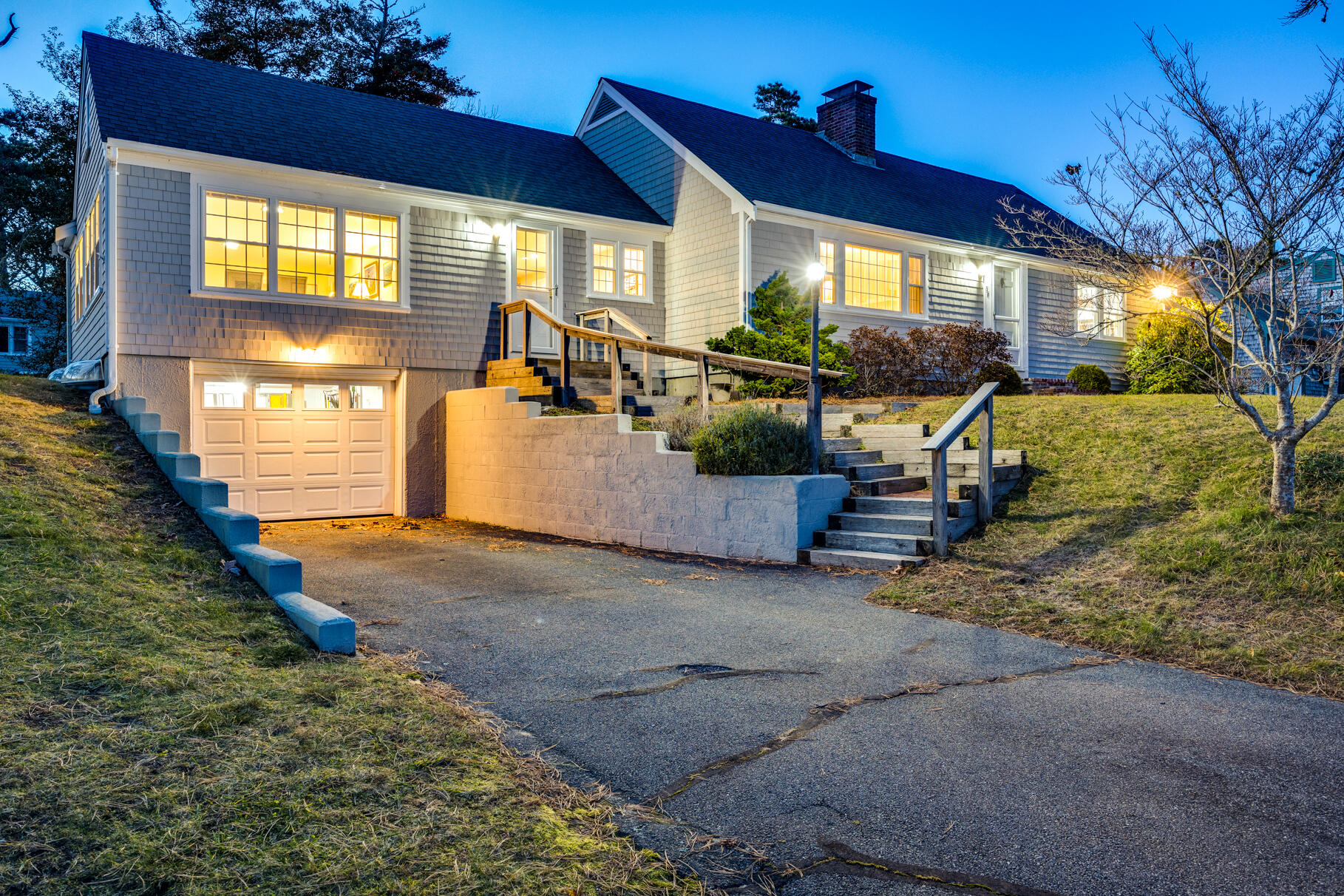 38 Rainbow Way Harwich, MA 02645 - Photo 2 of 50 a view of a porch with furniture and a yard