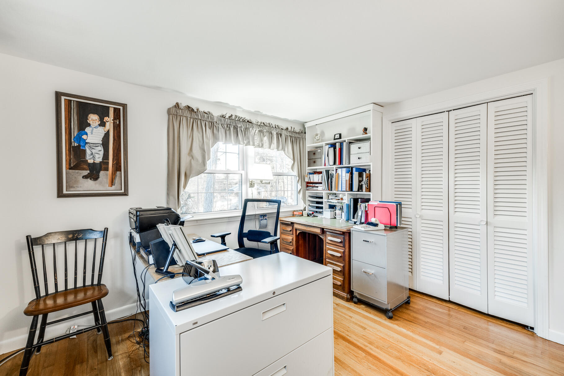 38 Rainbow Way Harwich, MA 02645 - Photo 28 of 50 a living room with furniture and a wooden floor