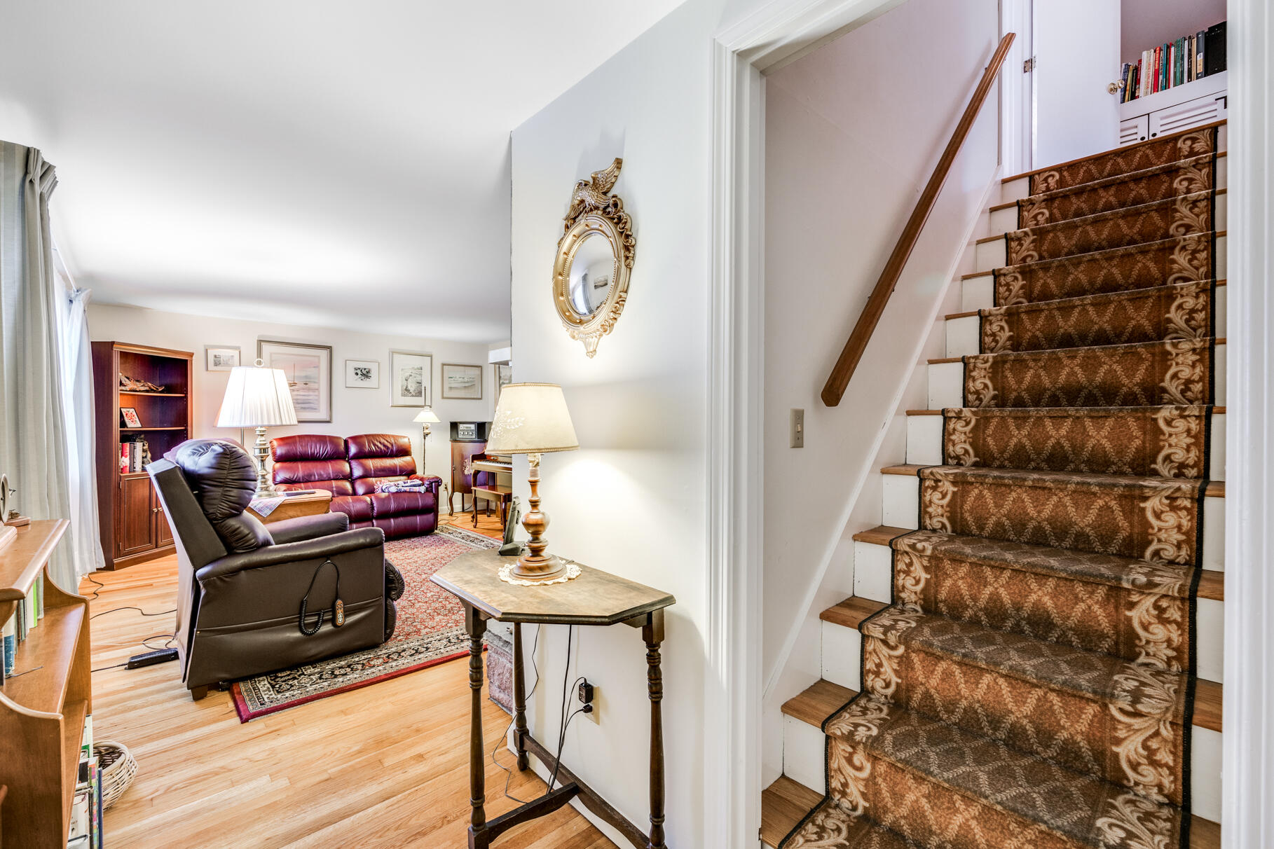38 Rainbow Way Harwich, MA 02645 - Photo 32 of 50 a living room with furniture and a fireplace