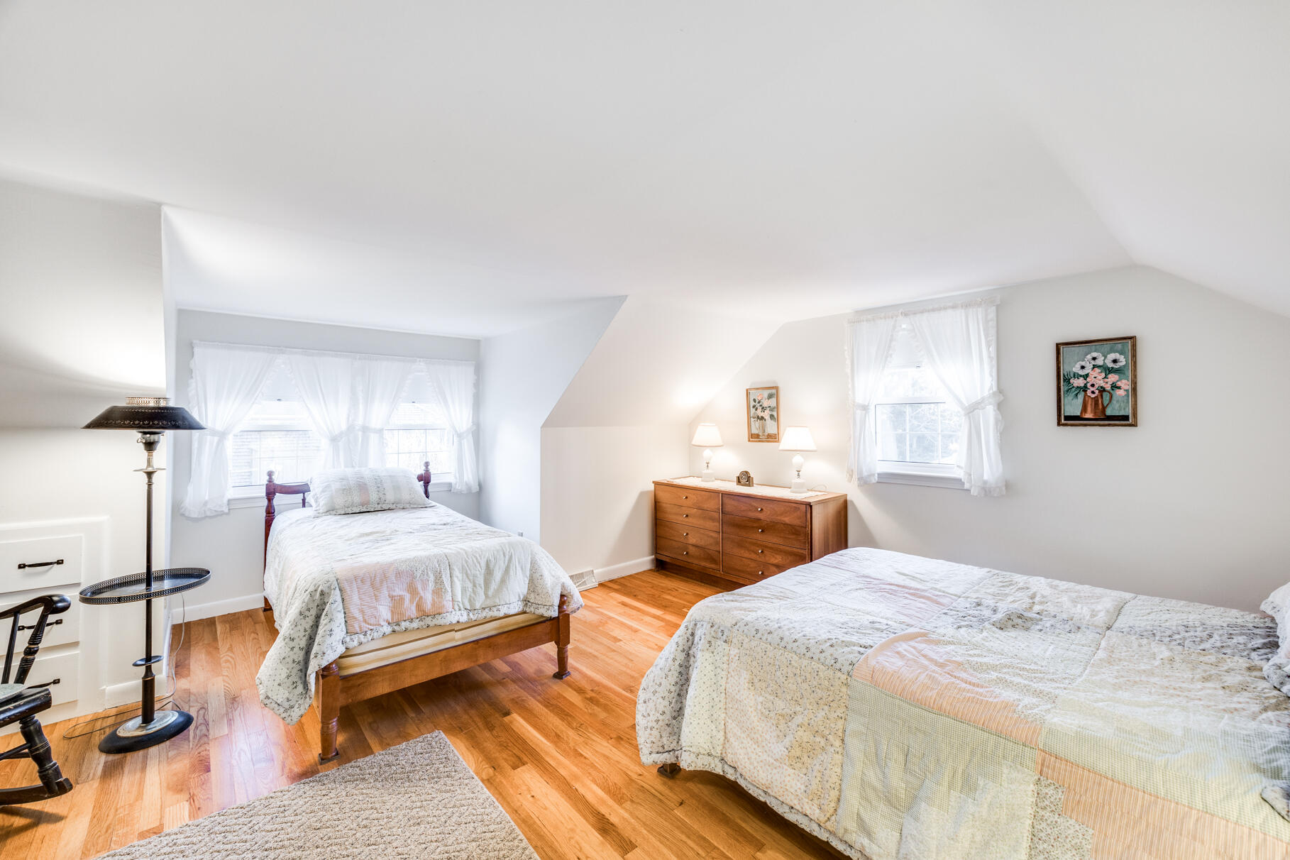 38 Rainbow Way Harwich, MA 02645 - Photo 35 of 50 a bedroom with a bed and wooden floor