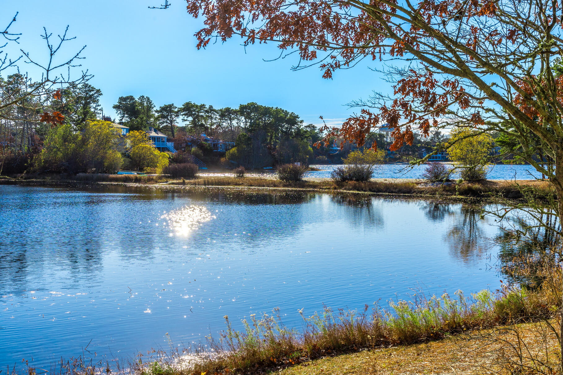 38 Rainbow Way Harwich, MA 02645 - Photo 43 of 50 a view of a lake with houses