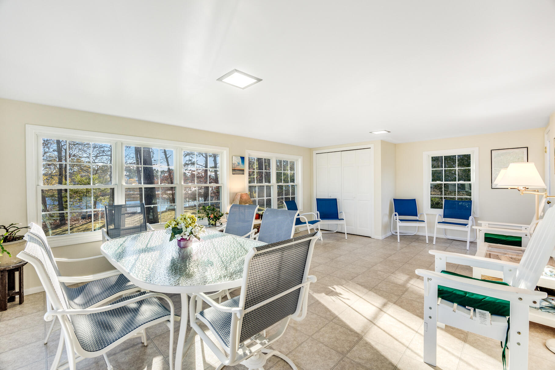 38 Rainbow Way Harwich, MA 02645 - Photo 7 of 50 a living room with furniture and a floor to ceiling window