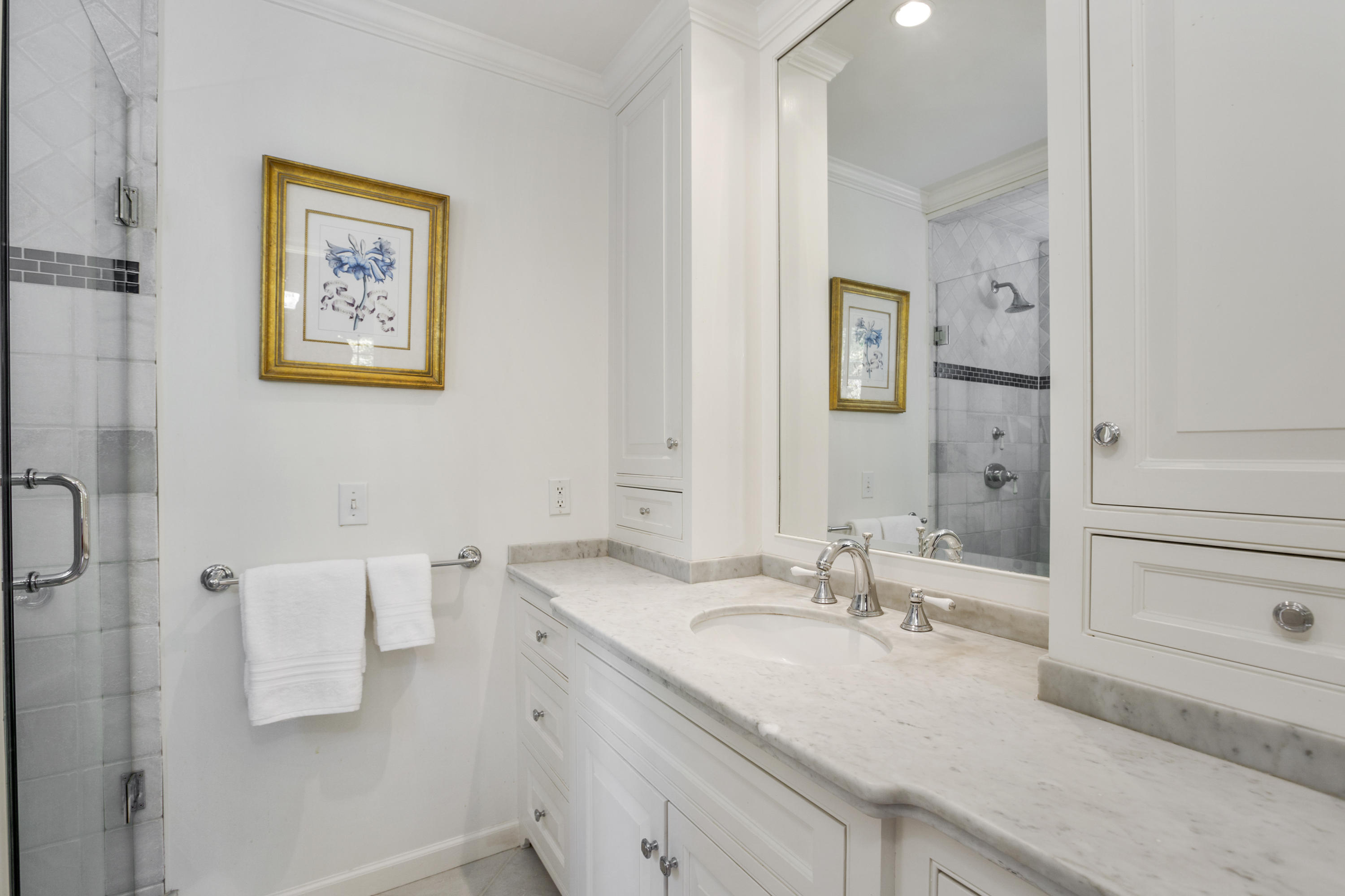 75 Delafield Island Road Darien, CT 06820 - Photo 18 of 28 a bathroom with a granite countertop sink mirror and vanity