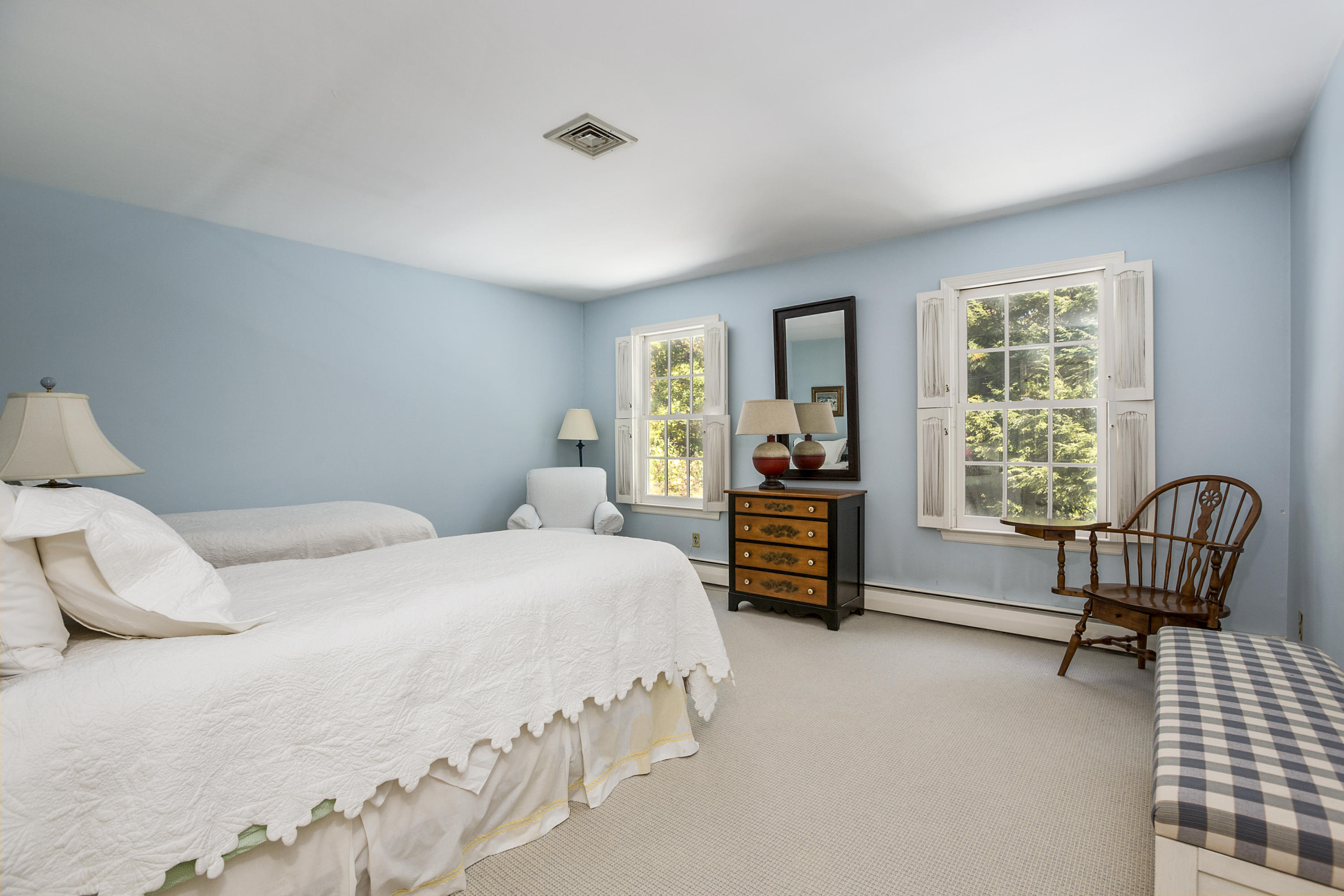 75 Delafield Island Road Darien, CT 06820 - Photo 19 of 28 a bedroom with a bed chair and window
