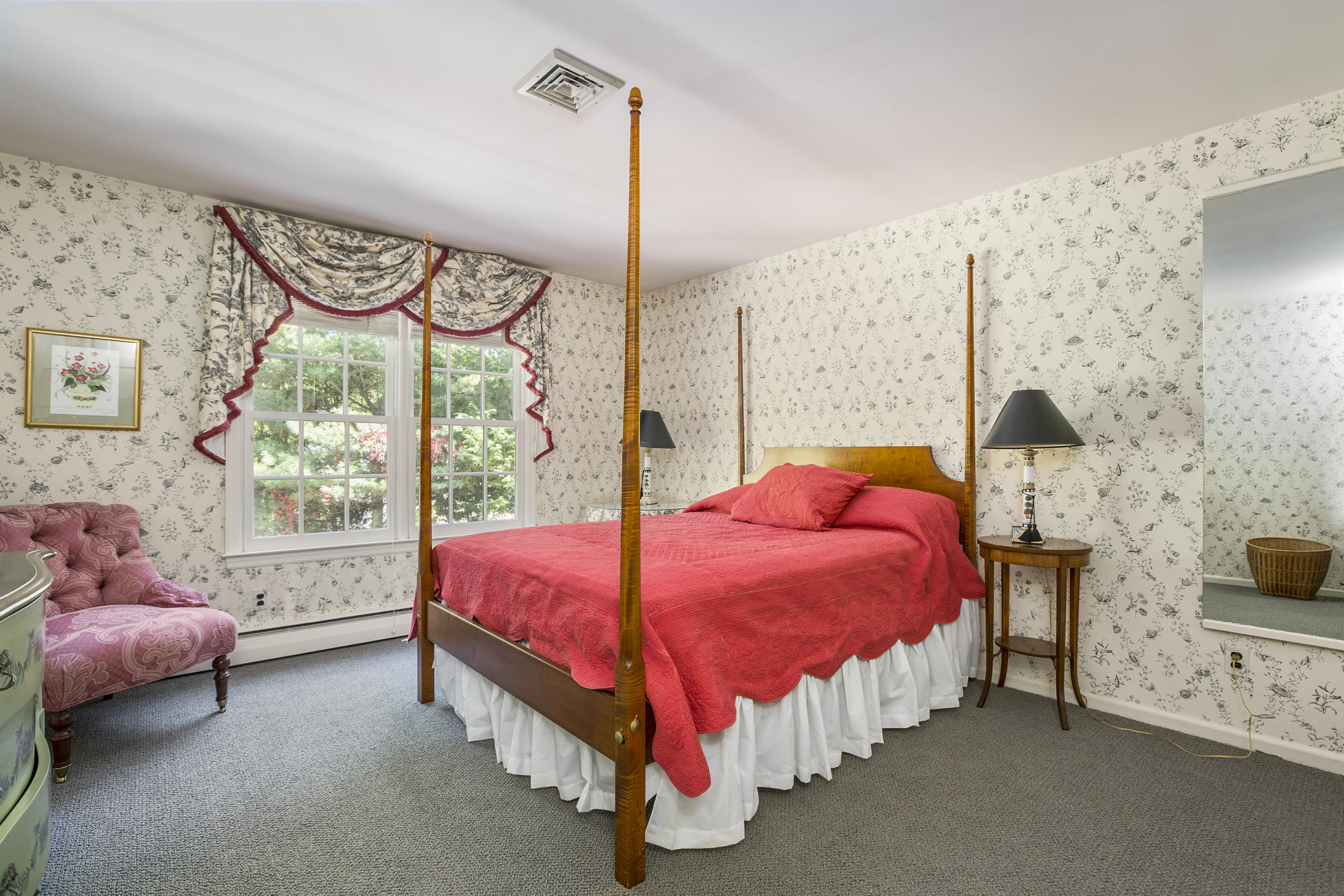 75 Delafield Island Road Darien, CT 06820 - Photo 20 of 28 a bed room with a bed and a window