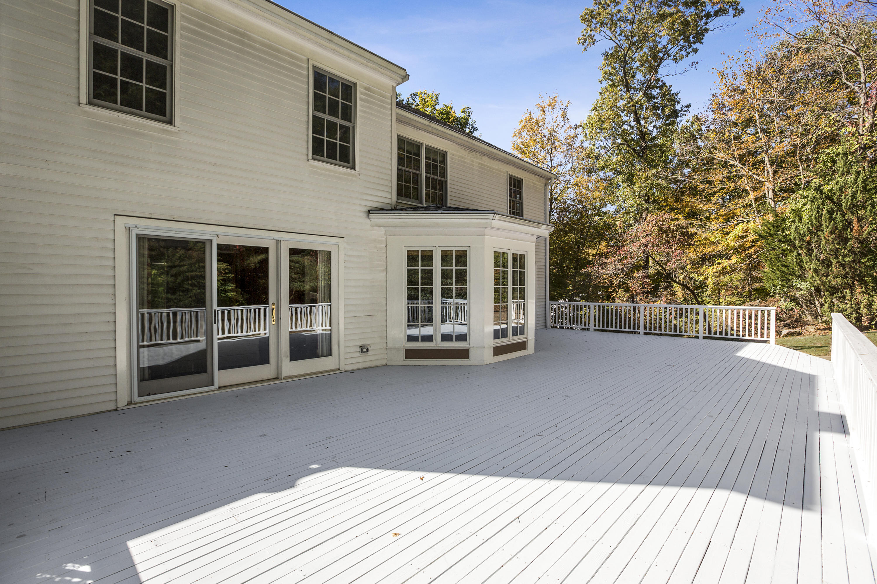 75 Delafield Island Road Darien, CT 06820 - Photo 24 of 28 a view of a house with a deck