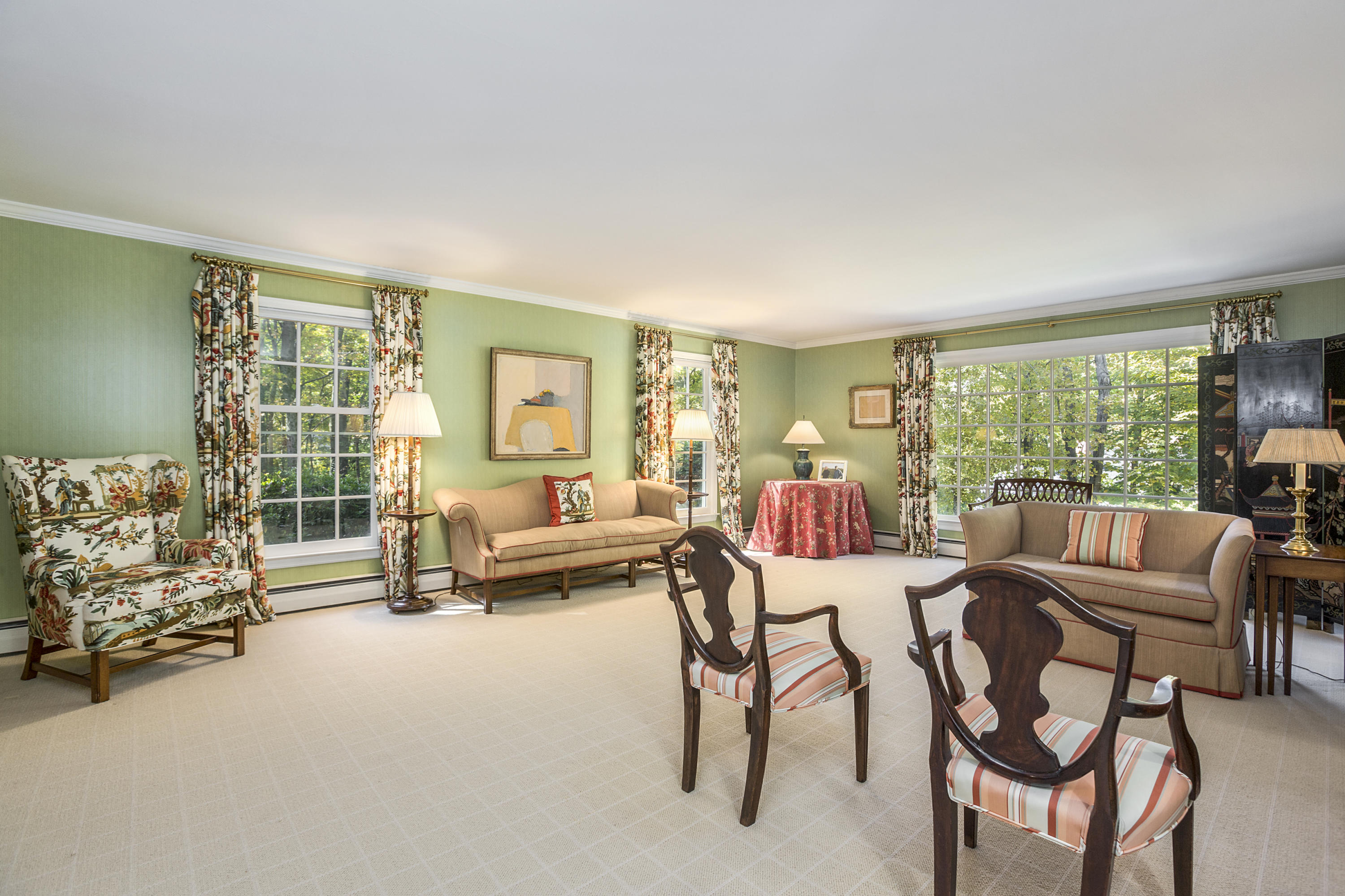 75 Delafield Island Road Darien, CT 06820 - Photo 5 of 28 a living room with furniture and a large window