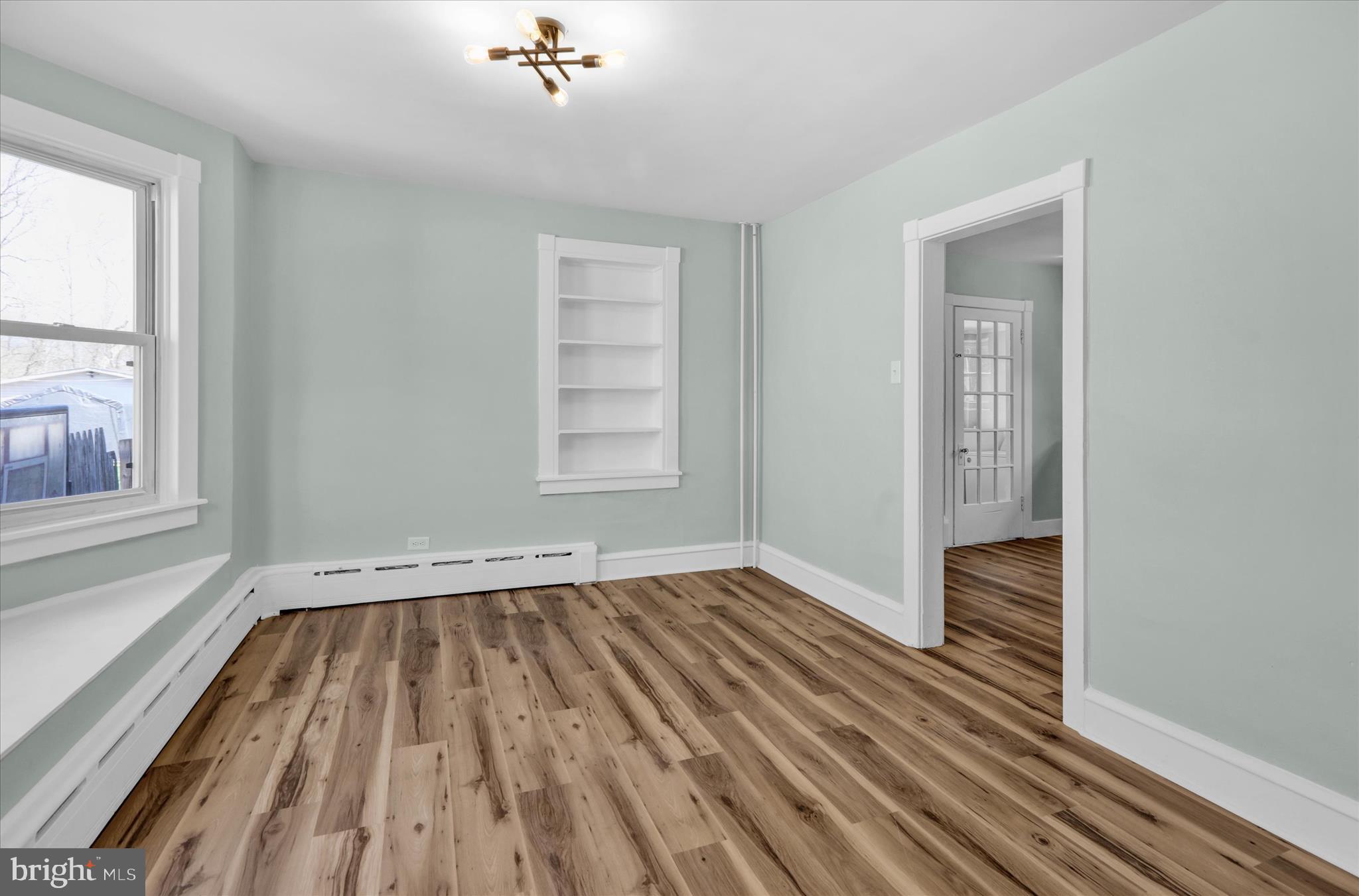 1425 Old River Road Birdsboro, PA 19508 - Photo 17 of 29 wooden floor in an empty room with a window