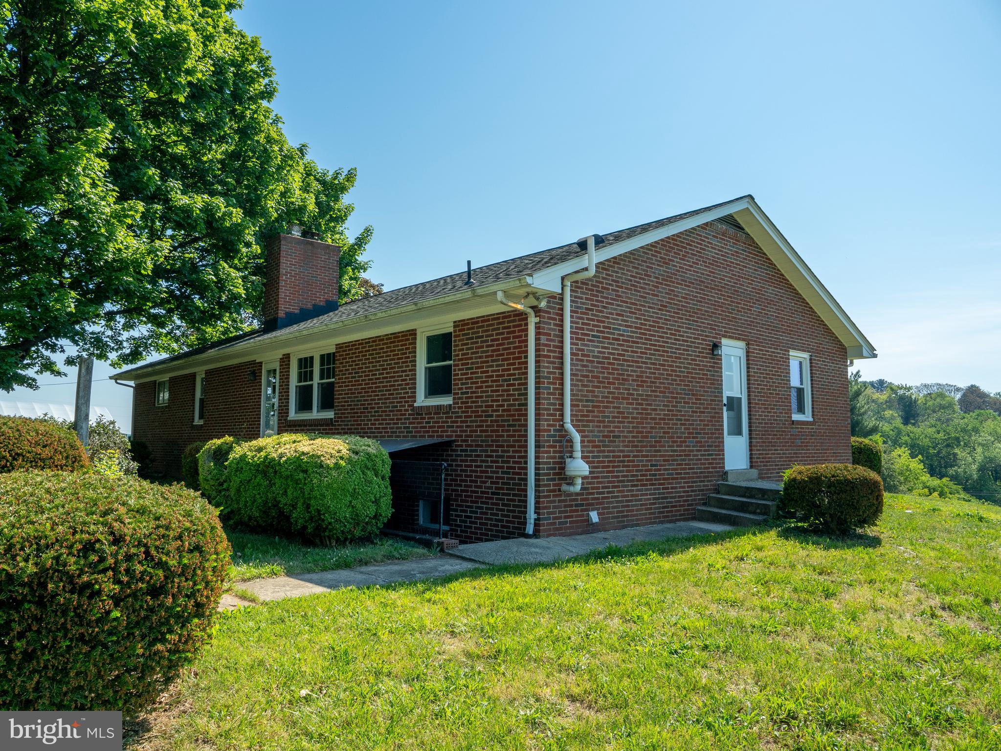 26906 Clarksburg Road Damascus, MD 20872 - Photo 2 of 17 a view of a house with a yard
