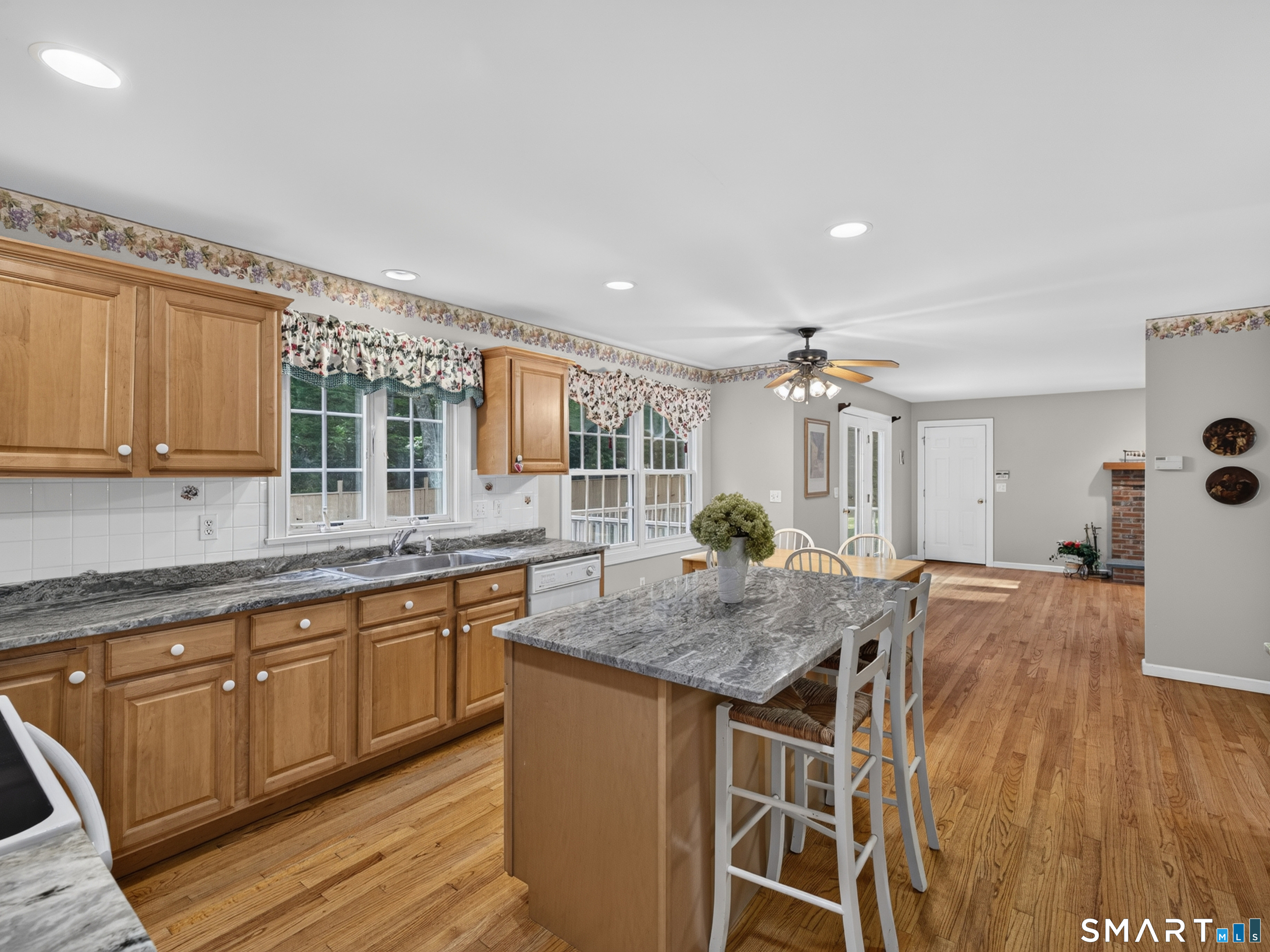 2125 Durham Road Madison, CT 06443 - Photo 14 of 40 Update kitchen opens up nicely to family room.