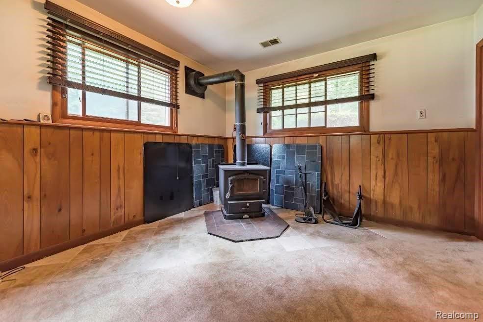6520 Crofoot Road Howell, MI 48843 - Photo 17 of 37 woodburning.jpg