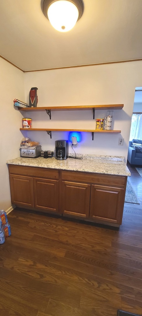 2423 Sand Lake Road Lindenhurst, IL 60046 - Photo 7 of 15 a utility room with stainless steel appliances wooden floor and window