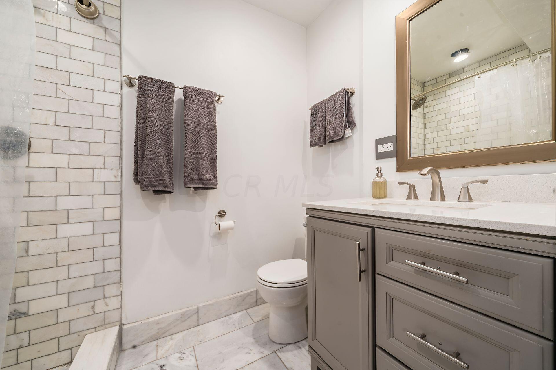 4495 Avery Road Hilliard, OH 43026 - Photo 17 of 41 Renovated in 2020 with new vanity,flooring,shower,mirror and fixtures