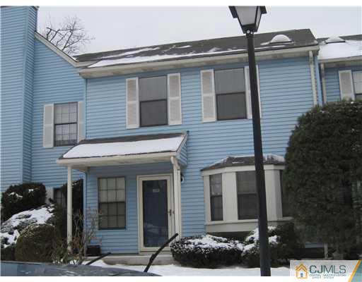 1202 Maplecrest Road Edison, NJ 08820 - Photo 1 of 10 a view of a house with a yard and potted plants