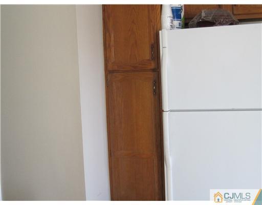 1202 Maplecrest Road Edison, NJ 08820 - Photo 9 of 10 a view of a kitchen