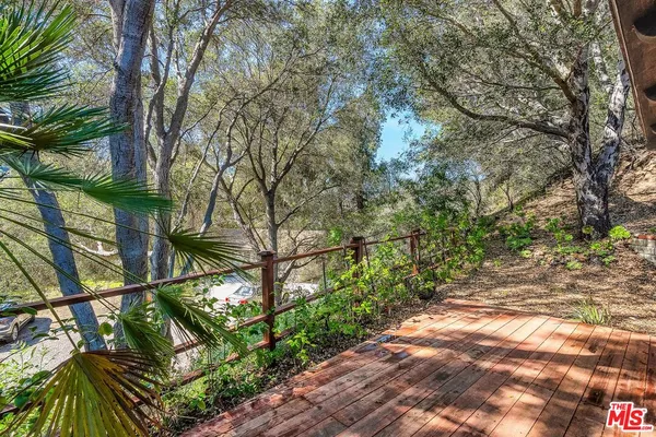 a view of a backyard with a garden