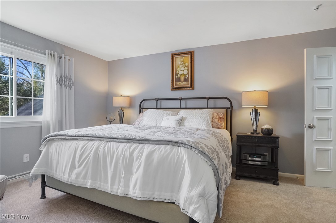 2070 Ridgewood Road Akron, OH 44313 - Photo 31 of 48 Bedroom with light carpet