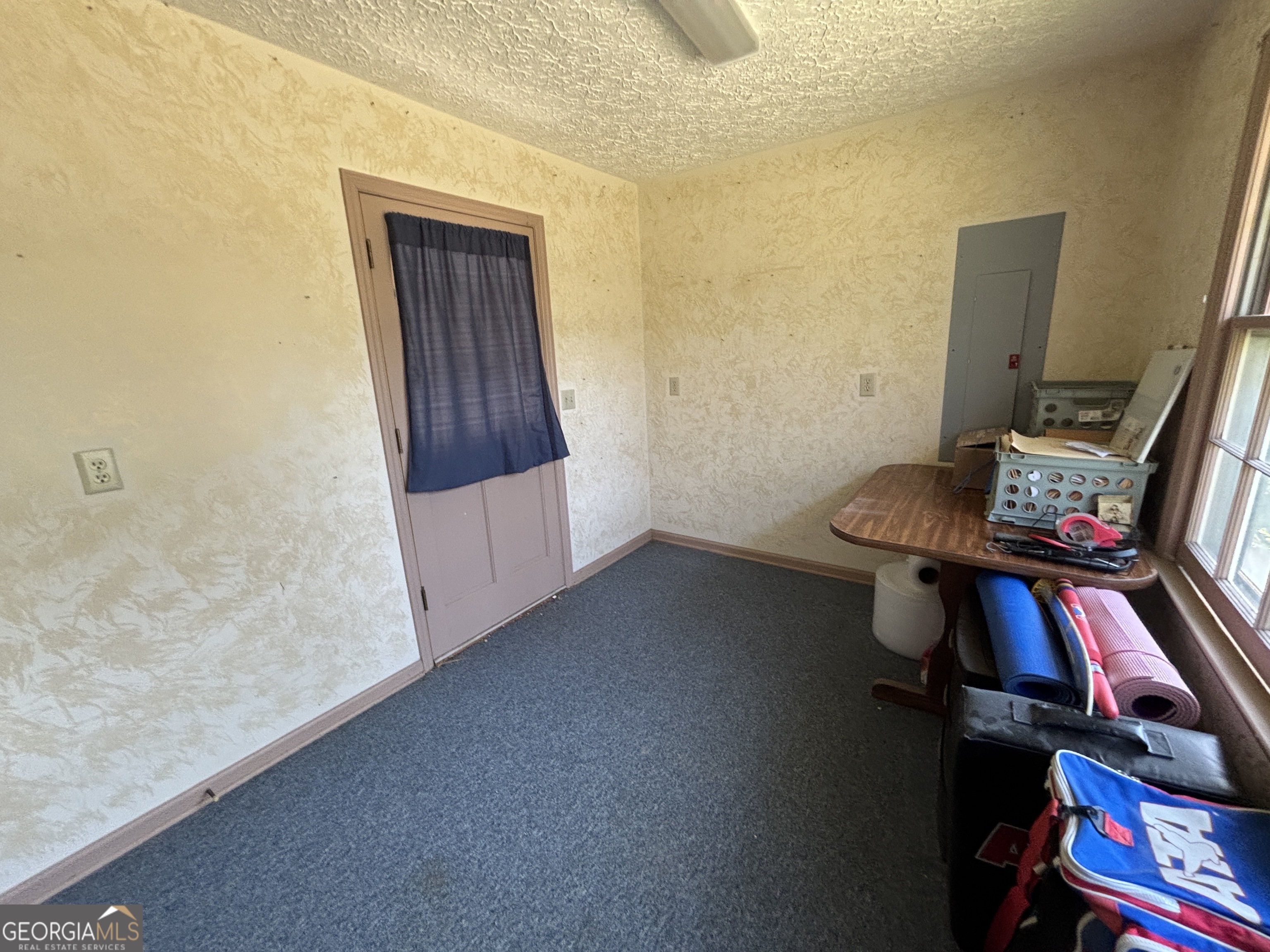 173 Berkley Road Cochran, GA 31014 - Photo 55 of 88 a view of room with furniture and wooden floor