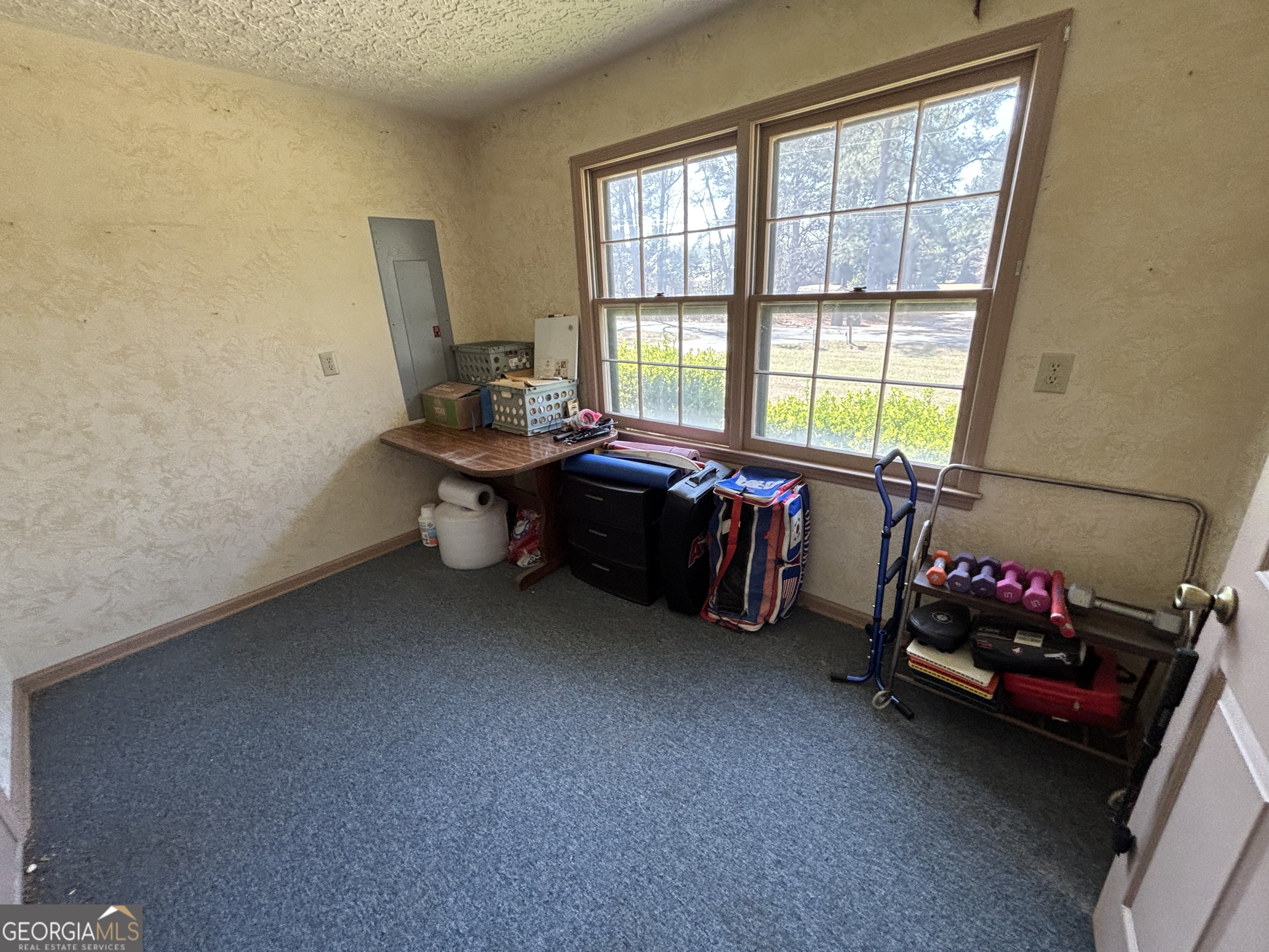 173 Berkley Road Cochran, GA 31014 - Photo 57 of 88 a kids room with toys and a window