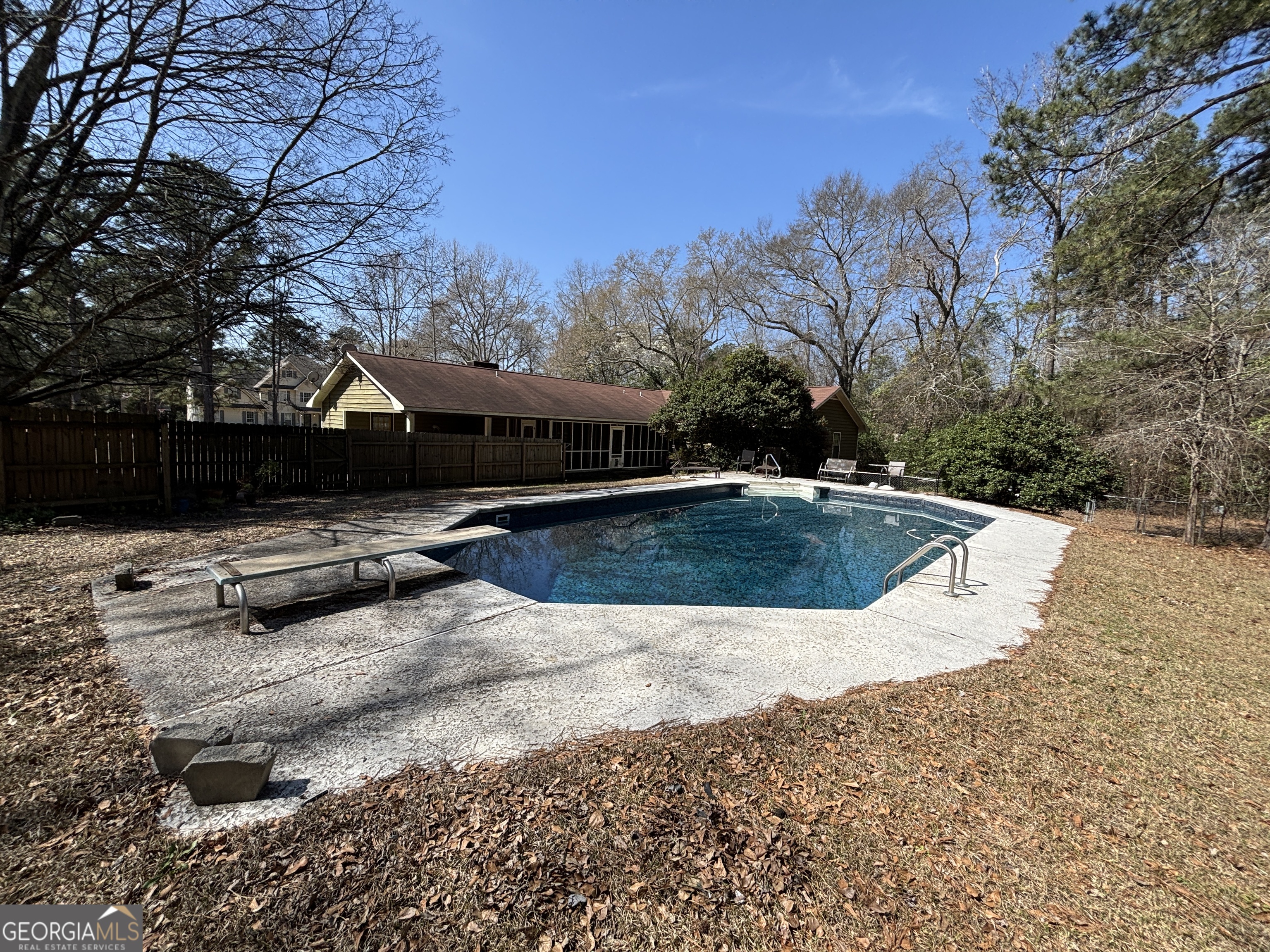 173 Berkley Road Cochran, GA 31014 - Photo 69 of 88 a view of swimming pool with a yard and a large tree