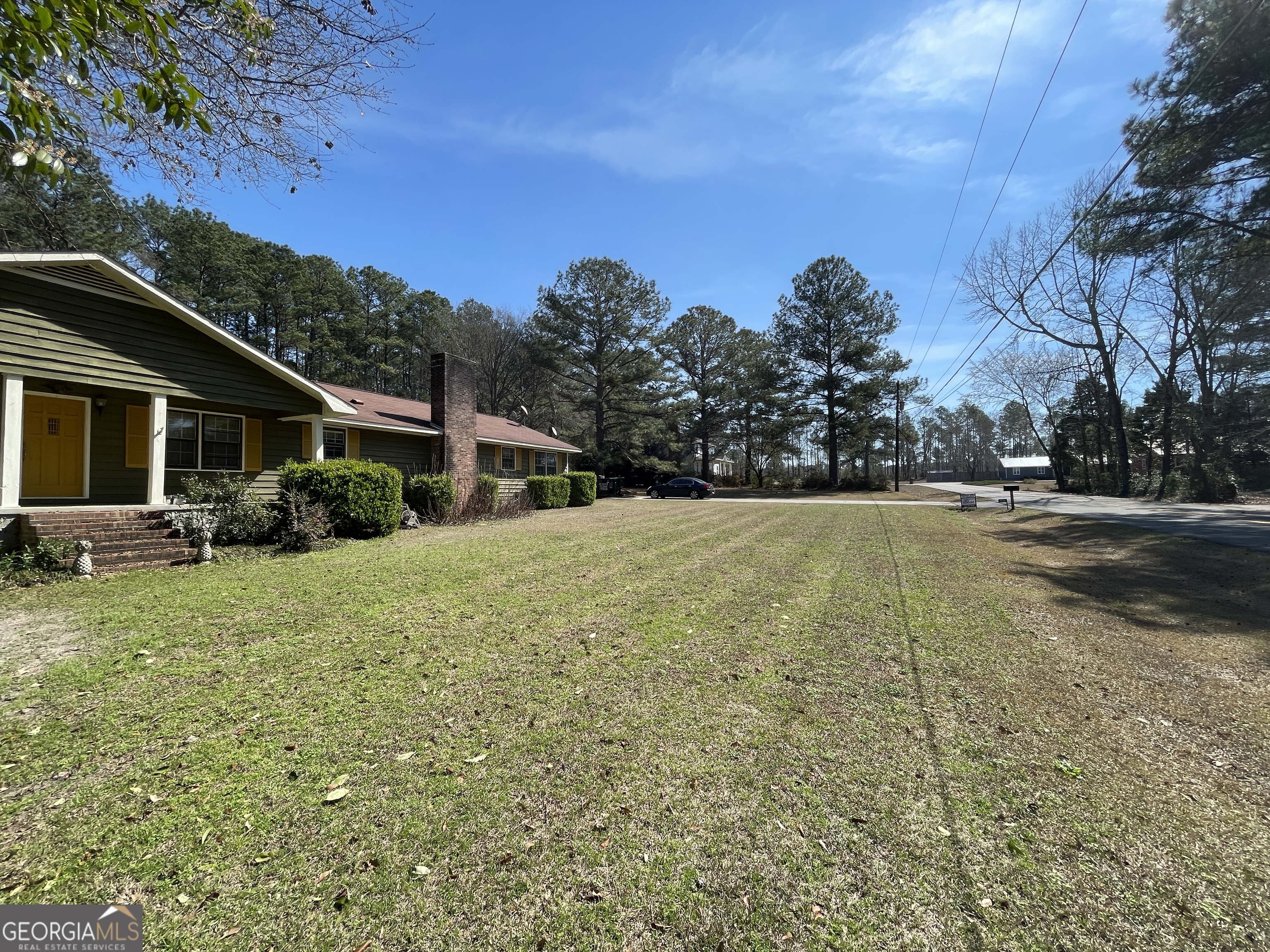 173 Berkley Road Cochran, GA 31014 - Photo 79 of 88 a backyard of a house with lots of green space