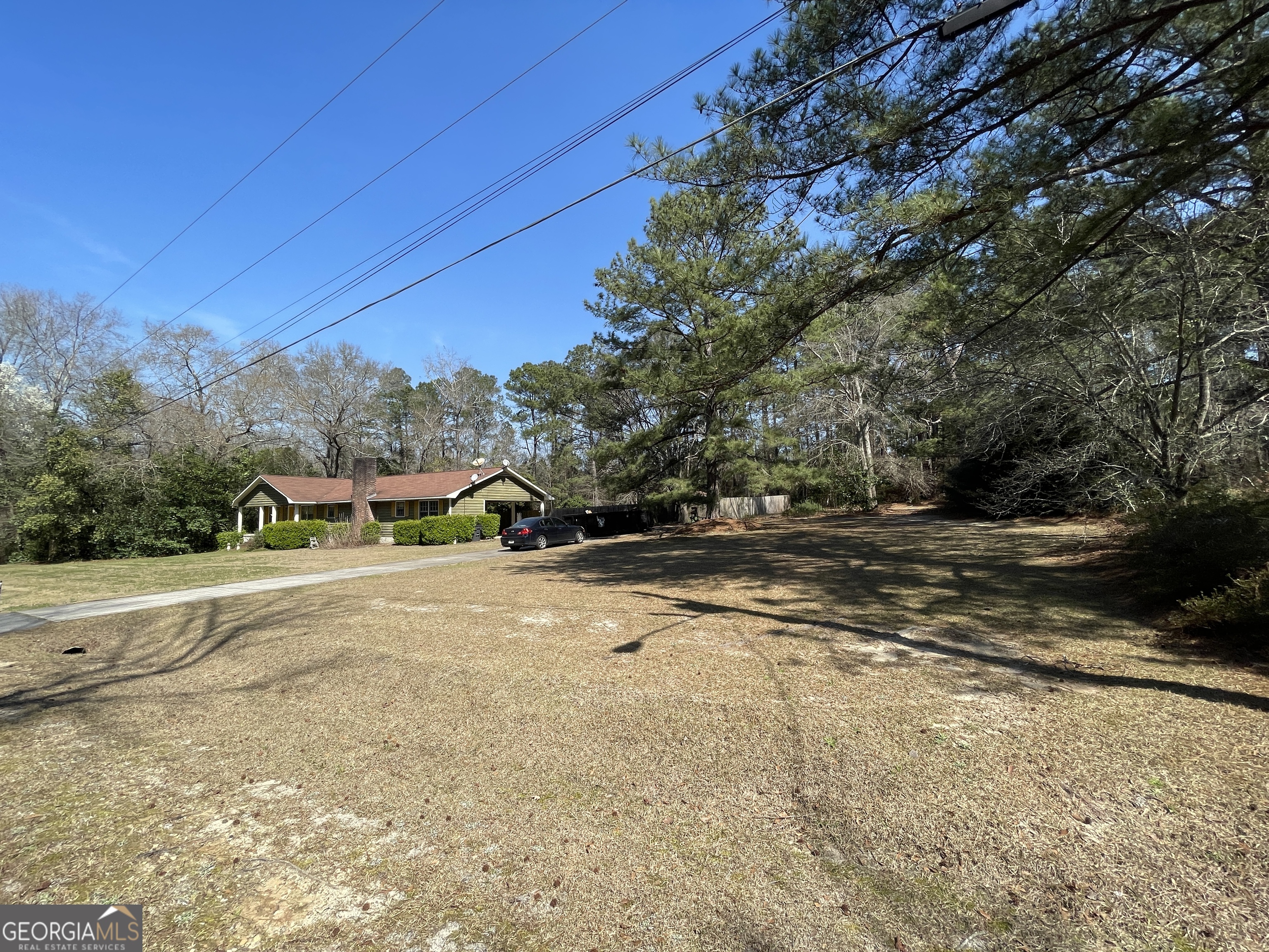 173 Berkley Road Cochran, GA 31014 - Photo 80 of 88 a view of a house with a yard