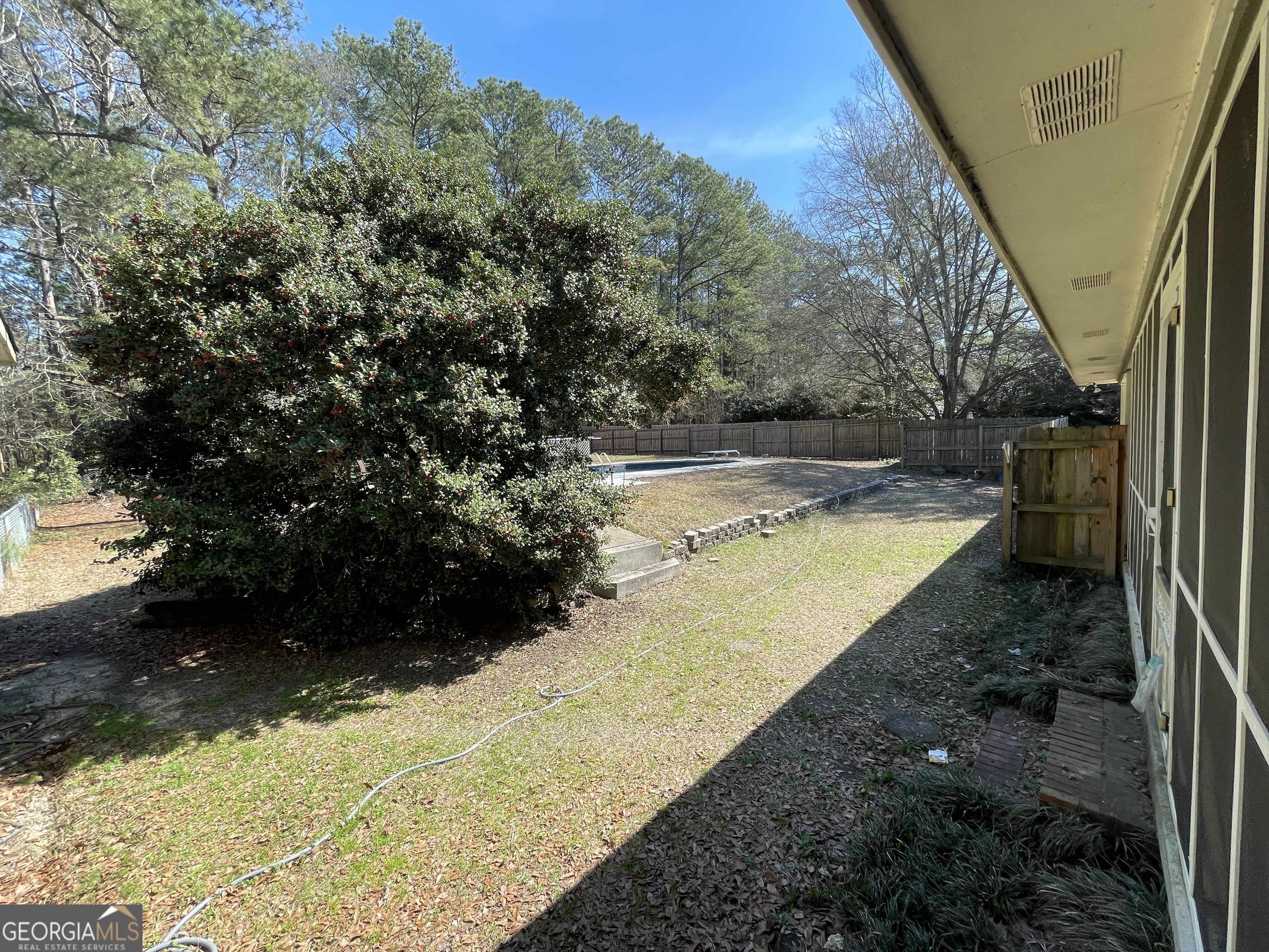 173 Berkley Road Cochran, GA 31014 - Photo 82 of 88 a view of a backyard of the house