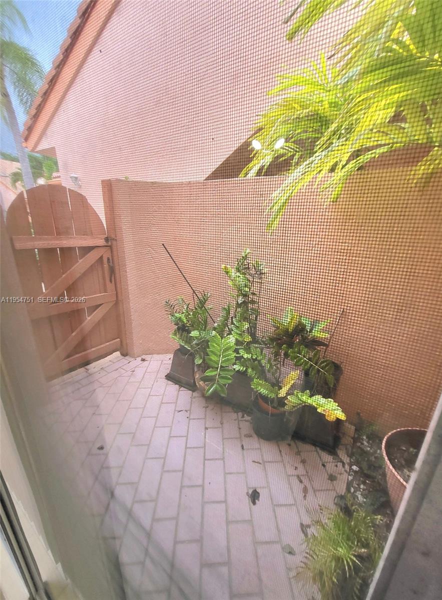 17286 Boca Club Boulevard, Unit 2108 Boca Raton, FL 33487 - Photo 19 of 25 a view of a back yard of the house