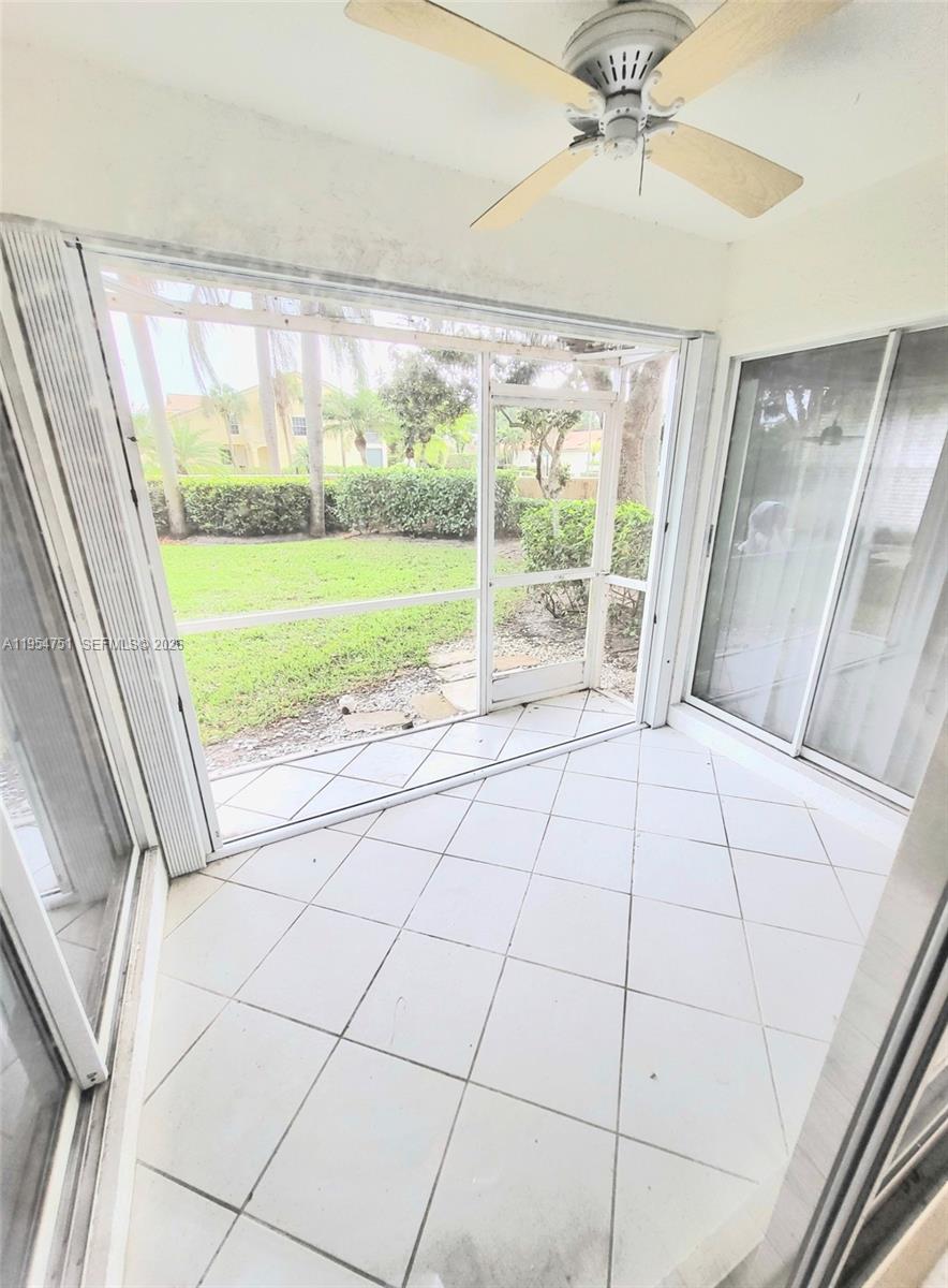 17286 Boca Club Boulevard, Unit 2108 Boca Raton, FL 33487 - Photo 21 of 25 a view of an empty room with a window