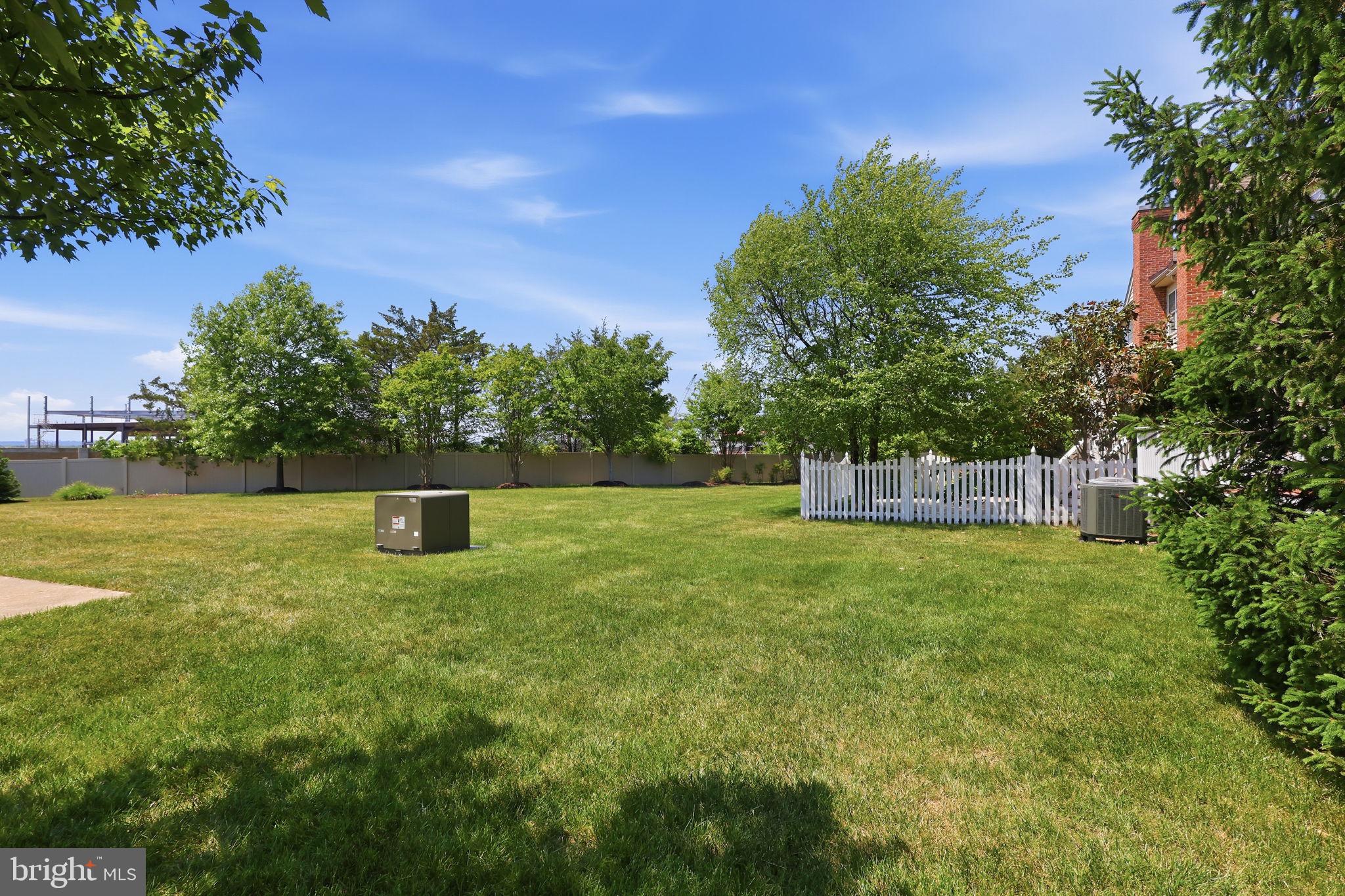 19617 Edgemont Square Ashburn, VA 20147 - Photo 55 of 65 a view of a garden with trees