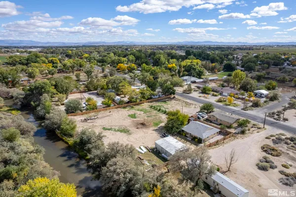 a view of a city with mountains in the background