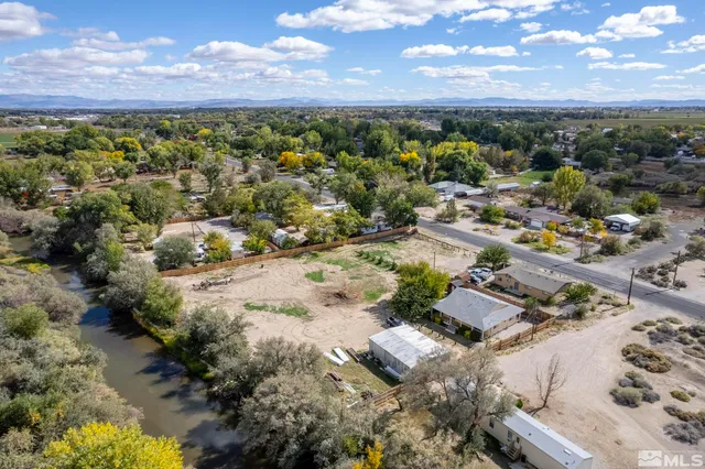 a view of a city with mountains in the background