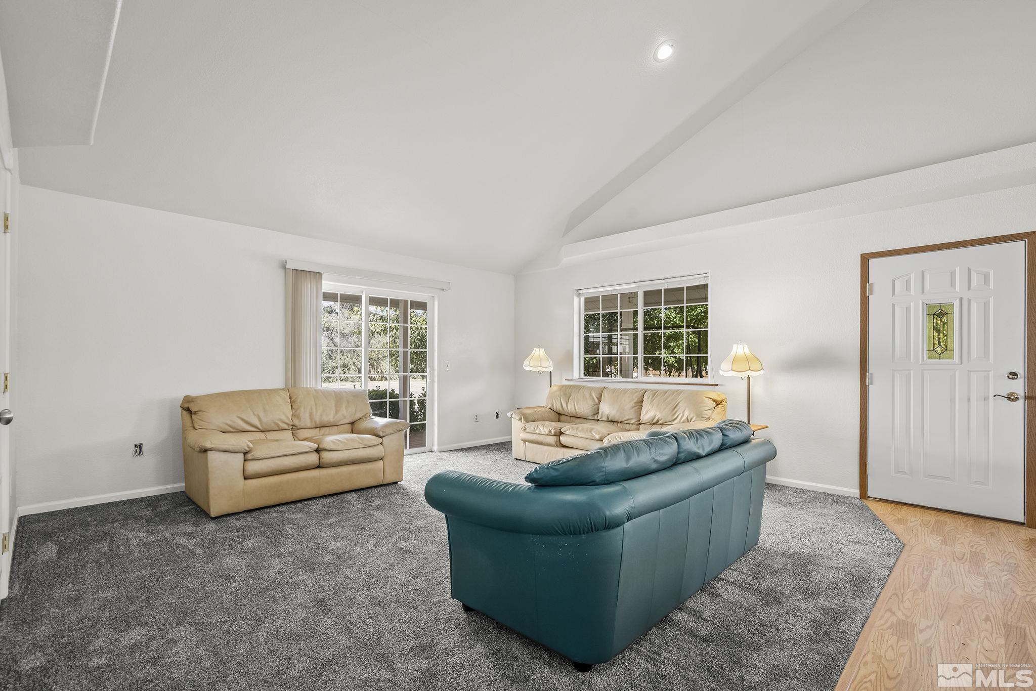 3300 Alcorn Road Fallon, NV 89406 - Photo 11 of 40 a living room with furniture and a large window