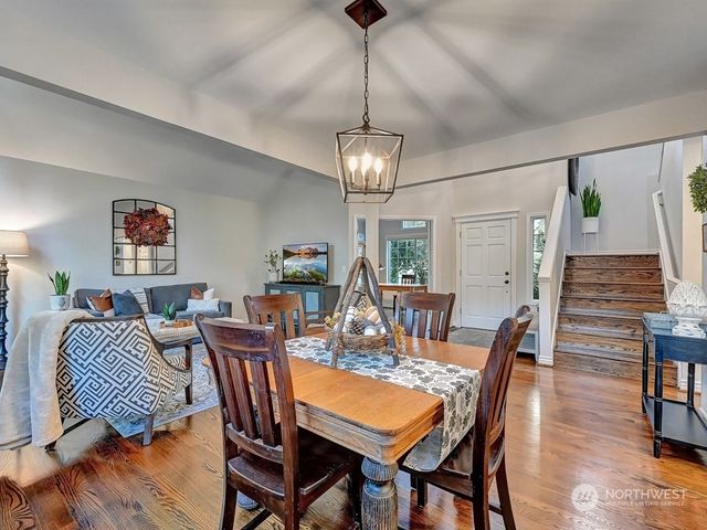a view of a dining room with furniture
