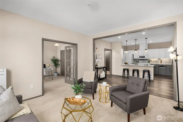 a spacious bathroom with double sink and a mirror