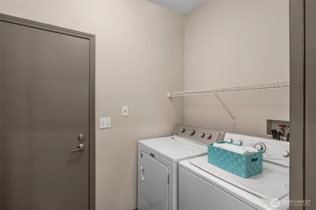 a bathroom with a sink a mirror and a light fixture