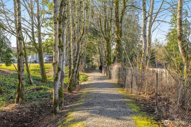 a front view of residential houses with yard