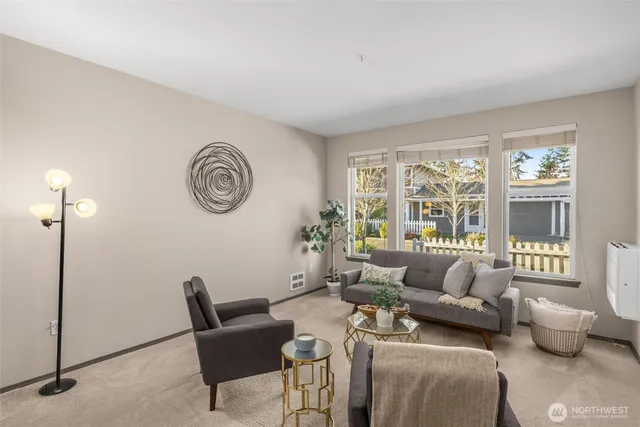 a workspace with furniture and a window