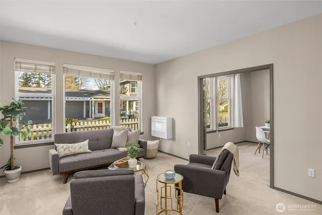 a workspace with furniture and a potted plant