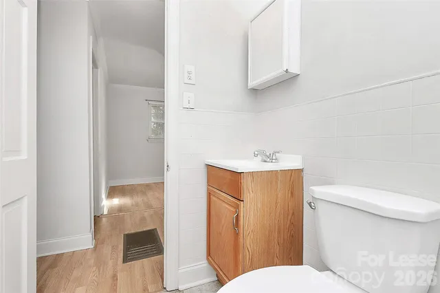 a bathroom with a toilet and a sink